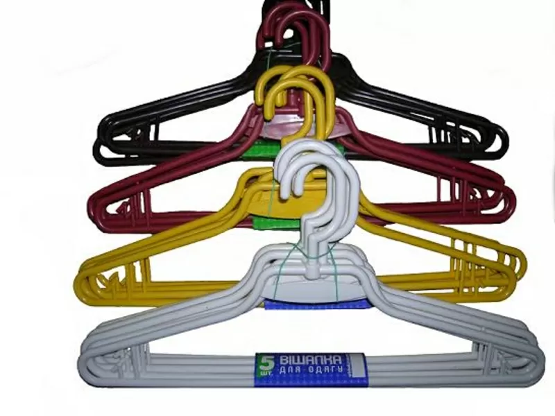 Вешалки-плечики,  вешалки,  тремпеля пластмассовые.